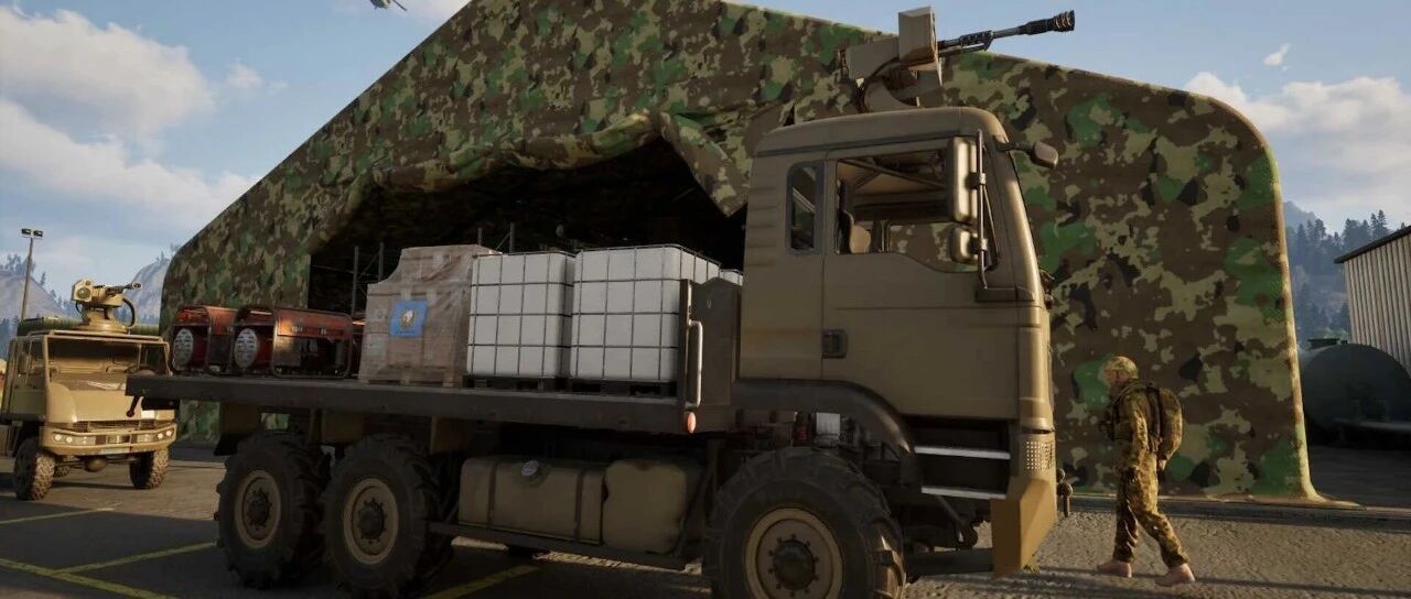 军卡驶过焦土，尘土飞扬